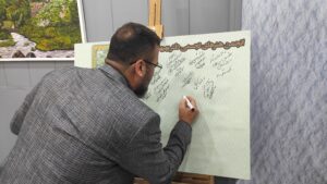 IMG ۲۰۲۵۰۳۰۲ ۱۸۰۳۲۳ نمایشگاه آثار برگزیده جشنواره کُنار بهبهان+عکس